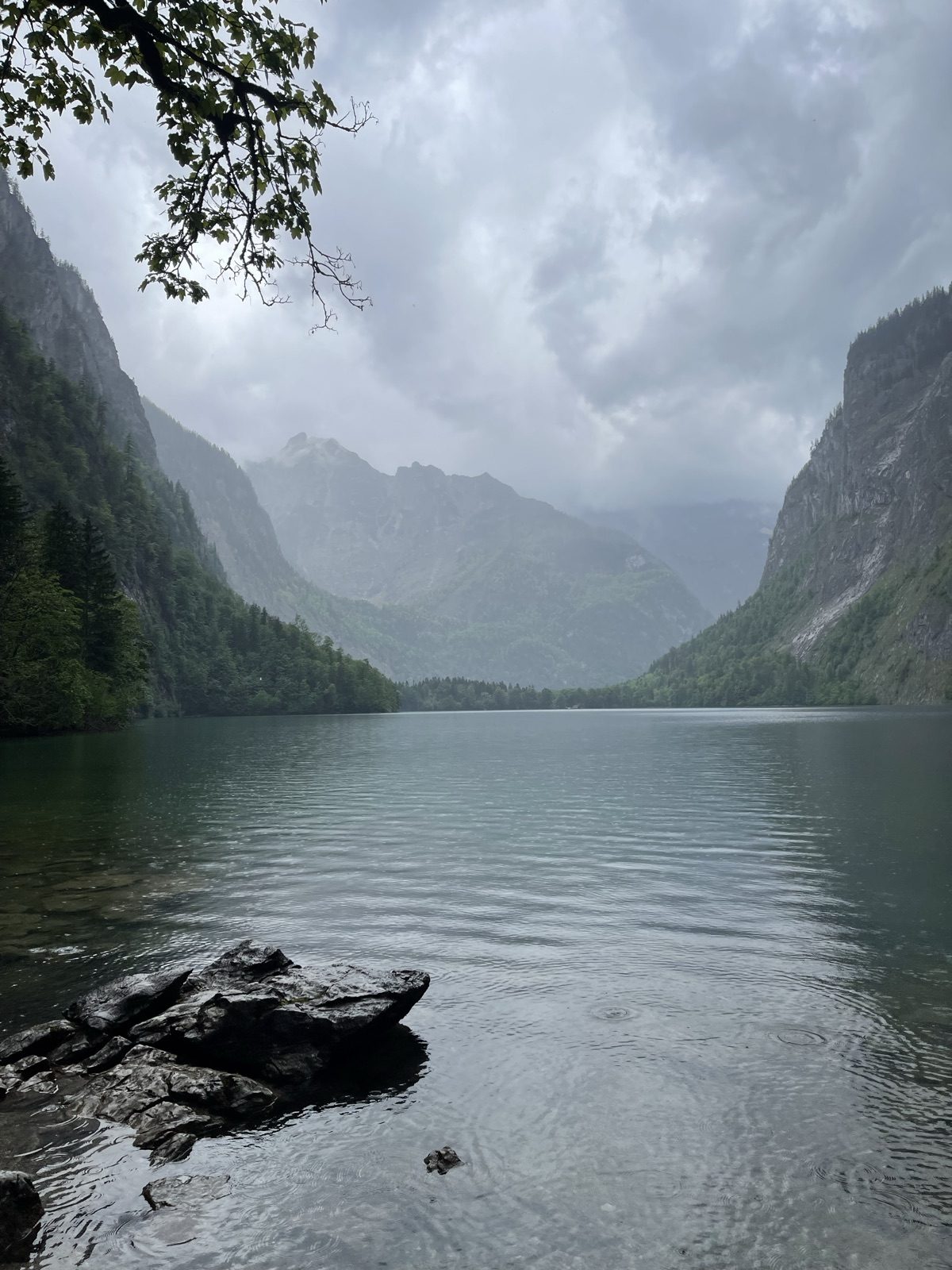 Rain moving across a mountain lake